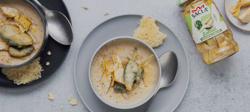 CREAMY CANNELLINI BEAN SOUP WITH SACLÀ ARTICHOKES, FRIED SAGE &amp; PARMESAN CRISPS